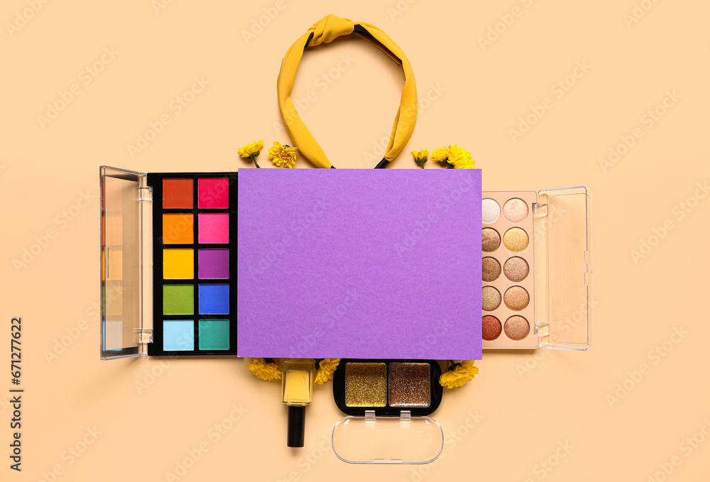 Composition with blank paper sheet, makeup products and beautiful flowers on beige background