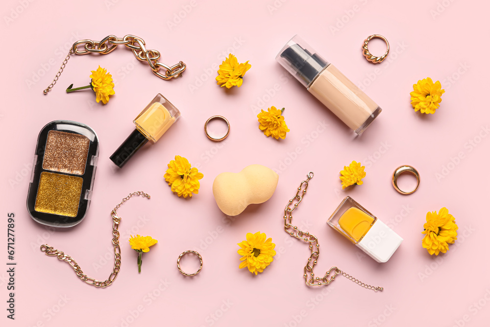 Composition with makeup products and beautiful chrysanthemum flowers on pink background