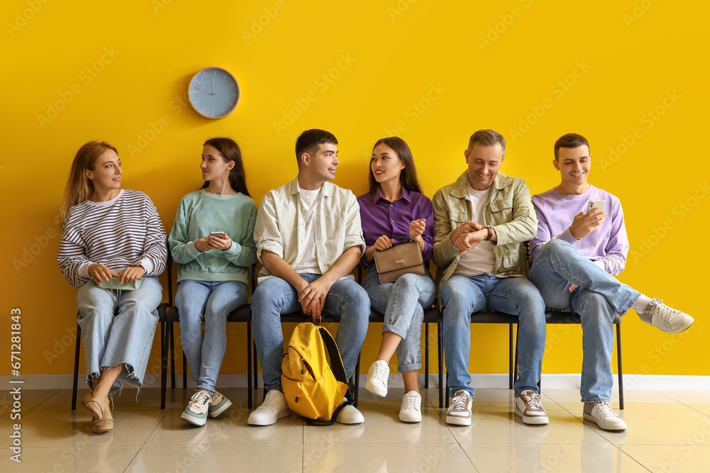 People waiting for their turn in room