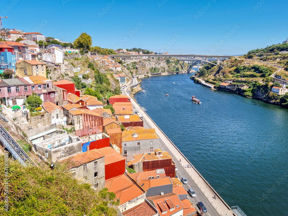 Aerial view of Ribeira, the Dom Luis bridge and the Douro river in Porto, Portugal