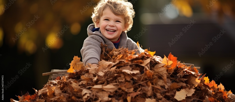 A depiction of a joyful adolescent male engaging in leaf play