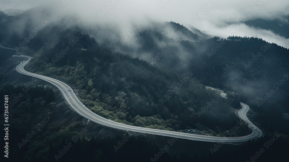 road in the mountains, Aerial top view of asphalt road through green forest, with foggy road