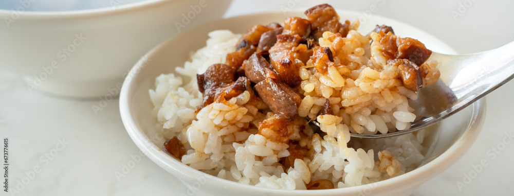 Braised meat over cooked rice, famous and delicious street food in Taiwanese restaurant.