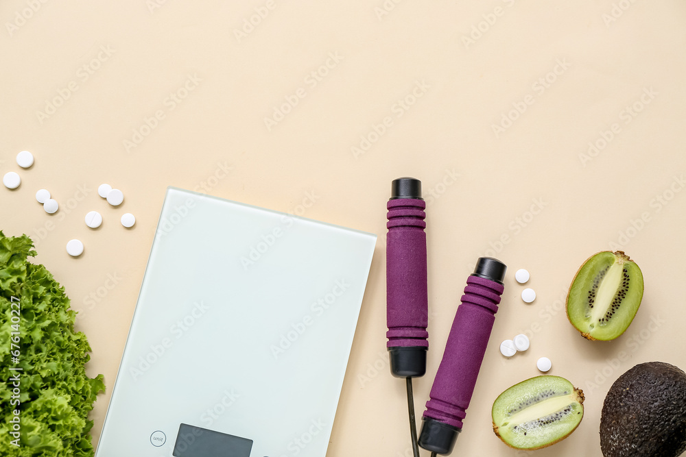 Composition with healthy food, pills and scales on color background