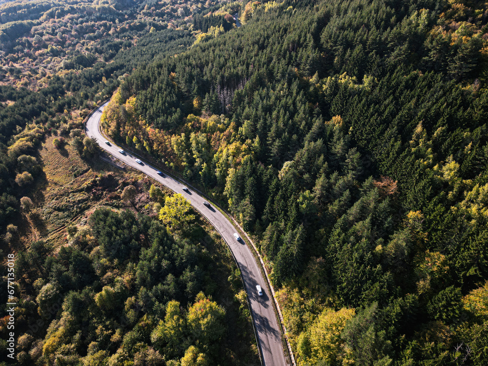 Cars driving on a twisty mountain road. Vitosha, Bulgaria