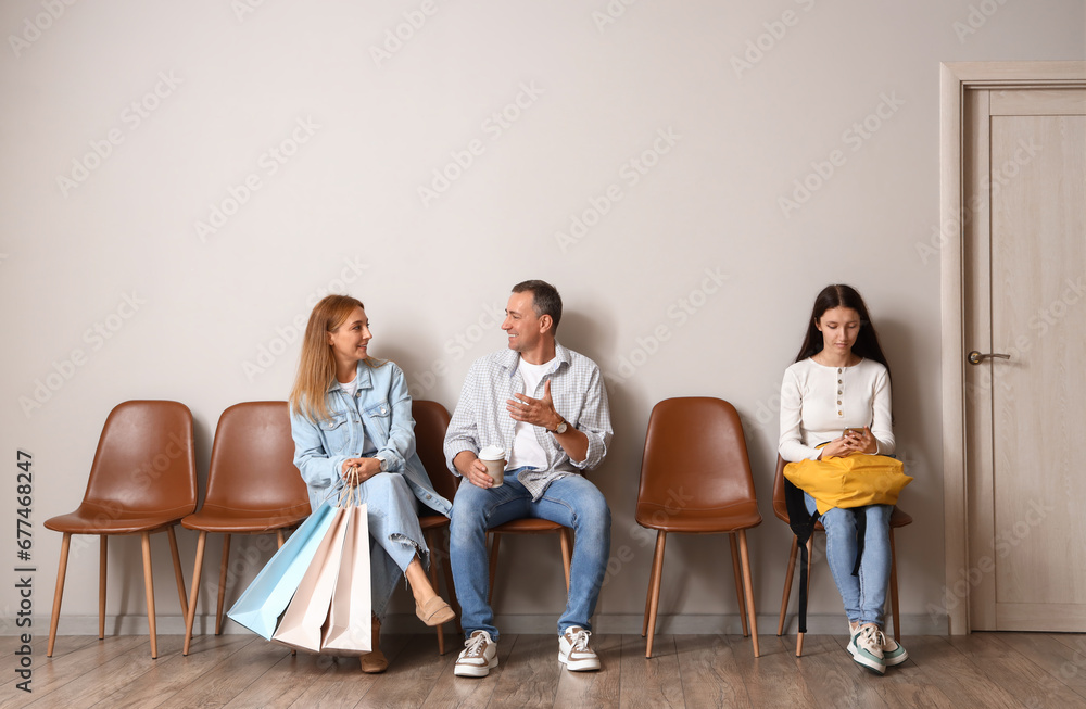 People waiting for their turn in room