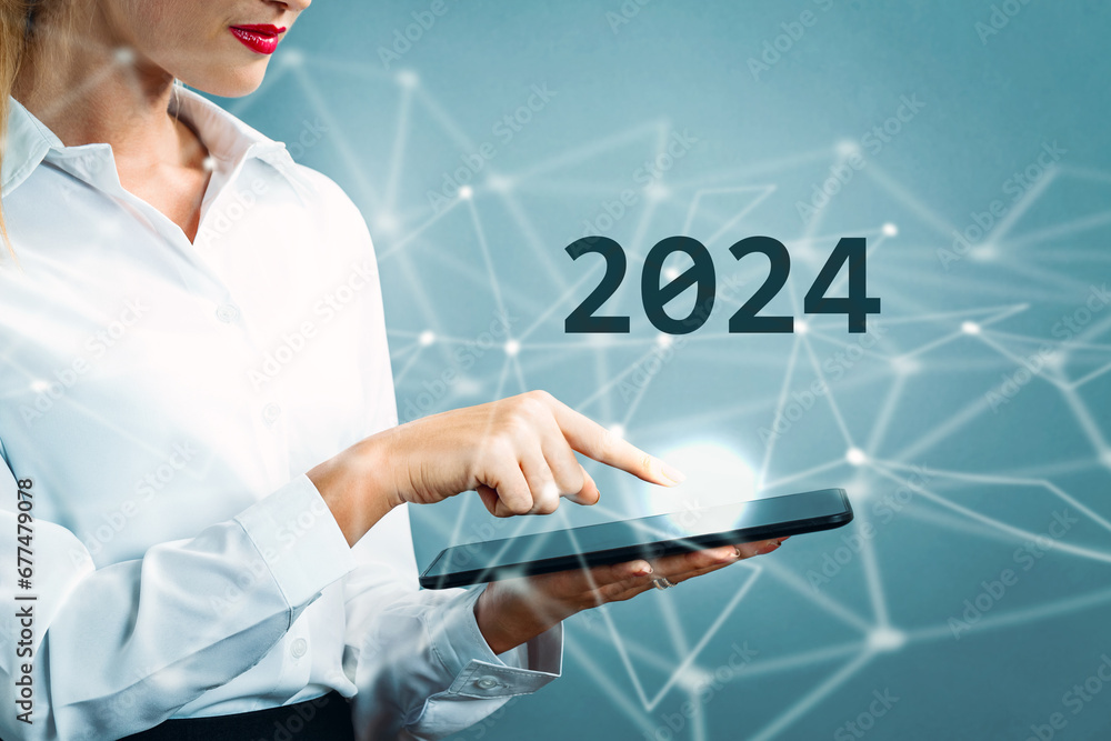 2024 text with business woman using a tablet