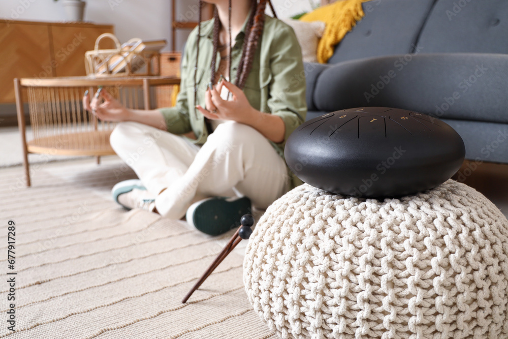 Glucophone on pouf in living room, closeup