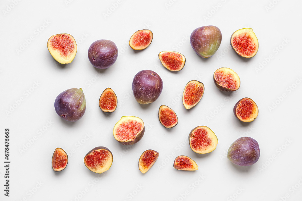 Fresh ripe figs on lilac background