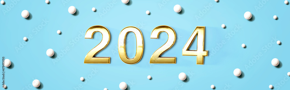 2024 new year theme with white candy dots - flat lay