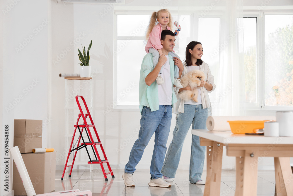 Happy family during repair of their new house