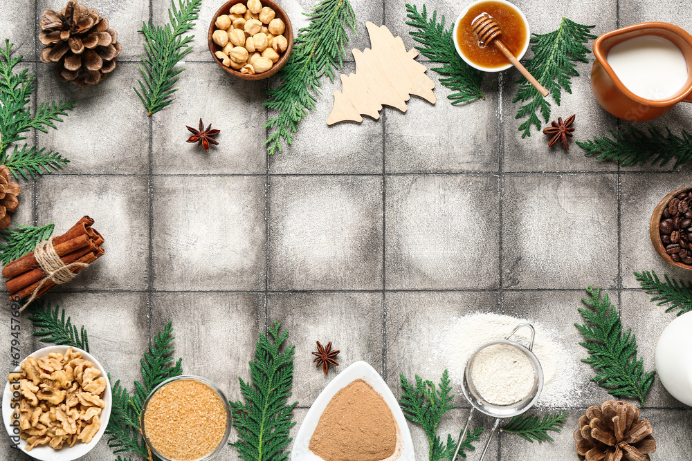 Frame made of different ingredients for preparing Christmas pie on grey tile background