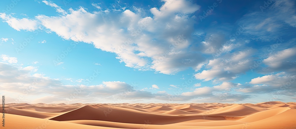 As the Indian sun began to set behind the stunning landscape of the desert park, the sky turned shades of blue, streaked with wisps of clouds reflecting hues of red, creating a breathtaking spectacle