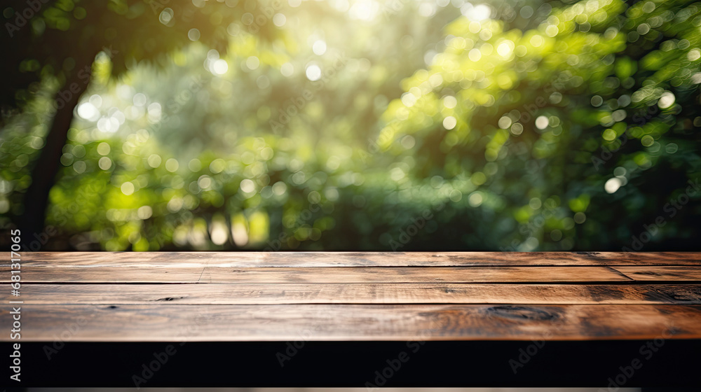 Empty wood plank table top with blur park green nature background bokeh light. Mock-up for display or montage of product.